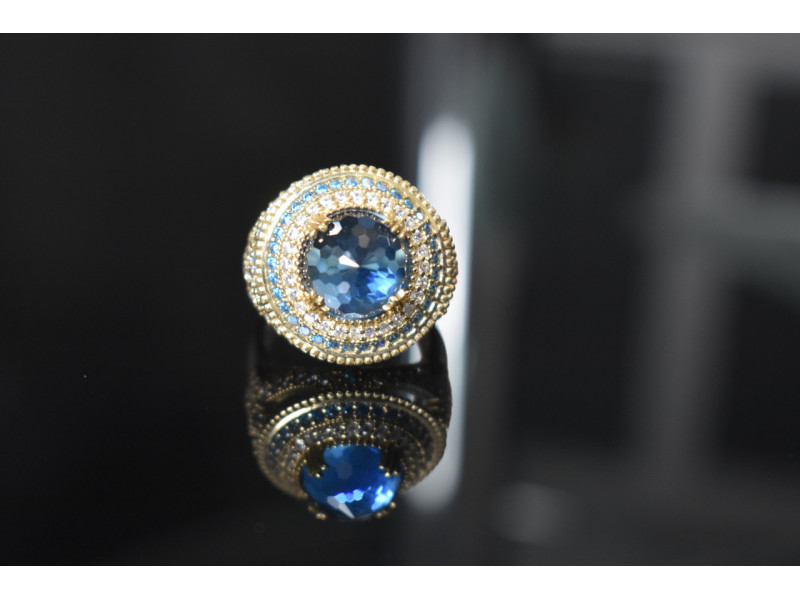 

Серебряное кольцо с голубым камнем Алпанит и фианитами Sky Jewelry 000782