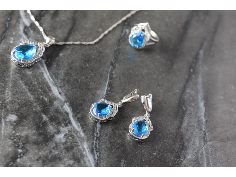 

Серебряный набор с Голубыми Фианитами *Имитация Топаза* Sky Jewelry 001168