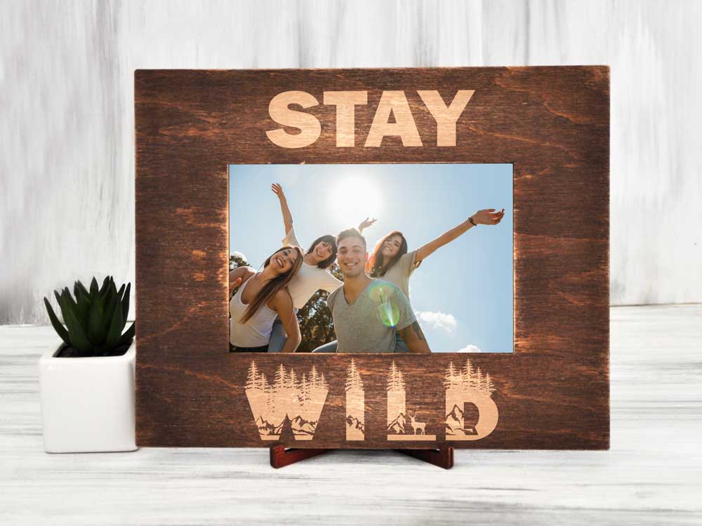 

Подарочная рамка для фото из натурального дерева с гравировкой "Stay wild" 15х21, горизонтальная, Темное дерево, WOODPRESENT