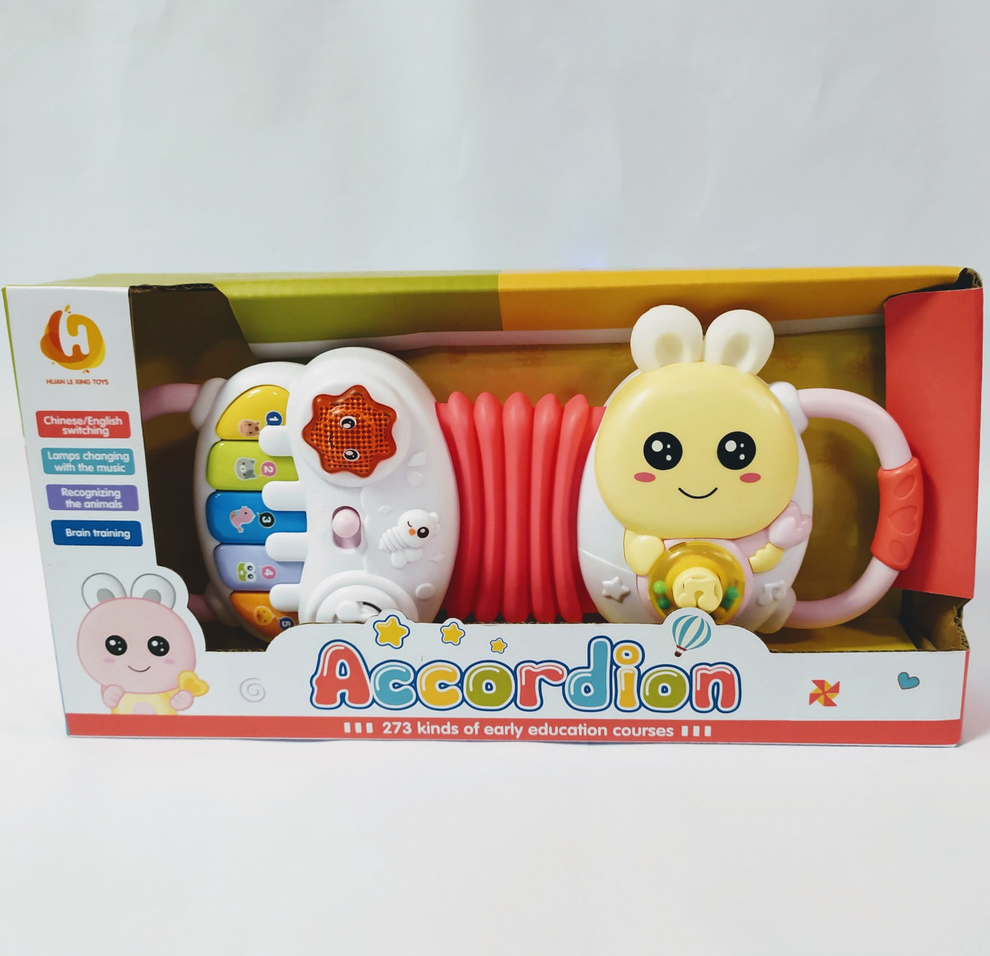 

Музыкальная игрушка Huan Le Xing Toys Пианино детское в форме аккордеона, розовый (997-18 A)