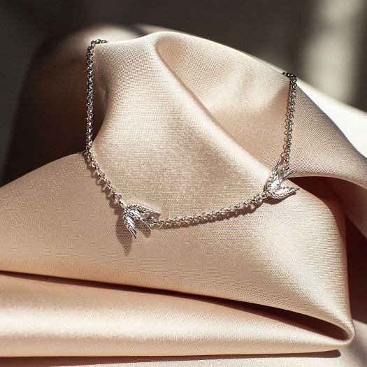 

Серебряный браслет с камнями Ласточки 4500 Белый