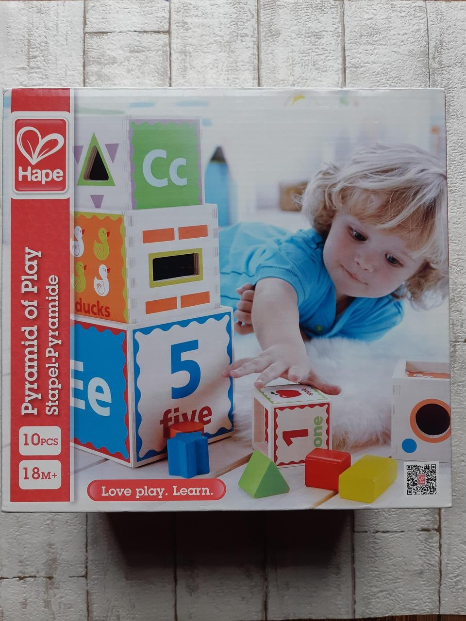 

Пирамидка Кубики Hape Е0413