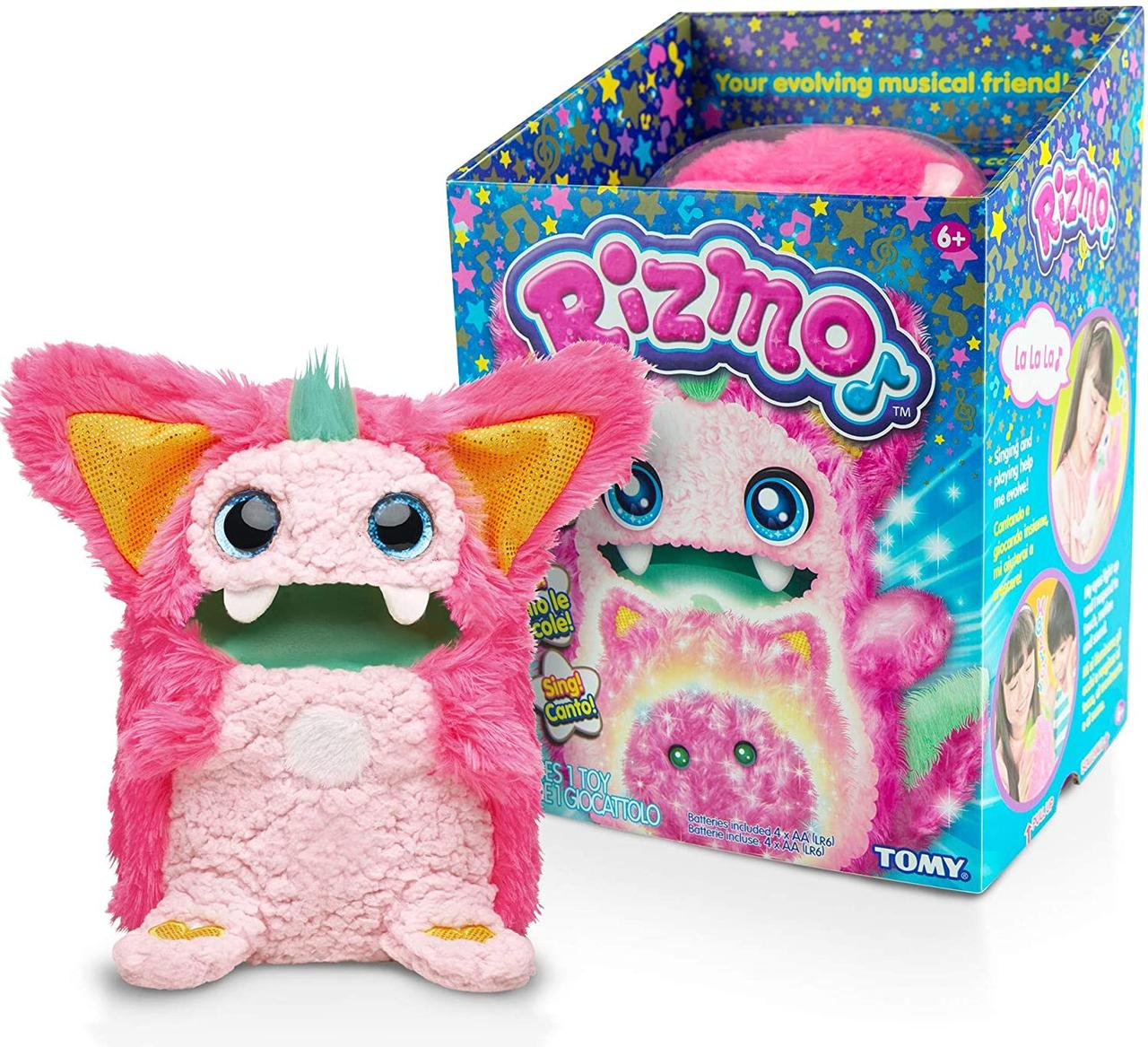 

Интерактивная игрушка Tomy Ризмо розовый Rizmo Evolving Musical Friend