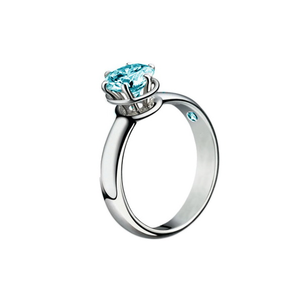 

Золотое кольцо с синим / цветным бриллиантом 0,75 ct. Diamant Elite 750°