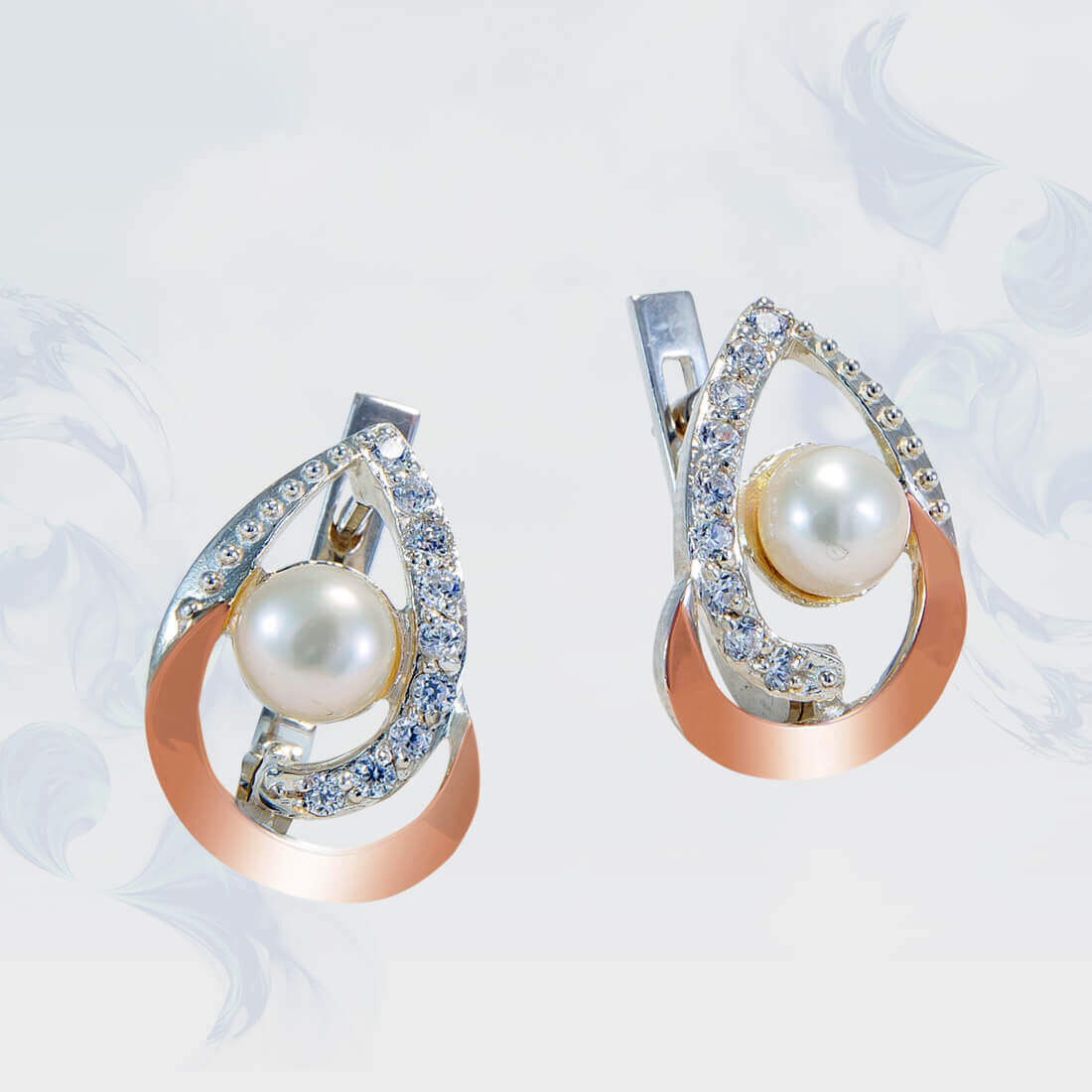 

Серьги из серебра с золотыми вставками SilverUA модель 147