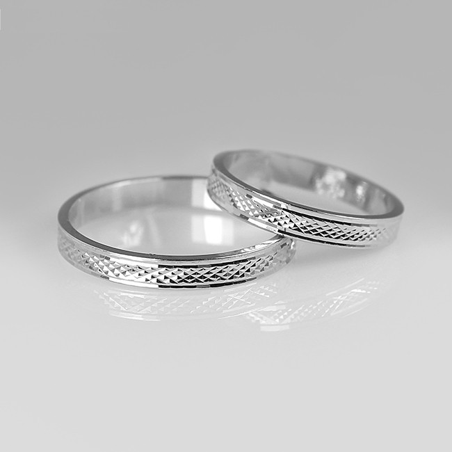 

Пара обручальных колец Американка с гранением