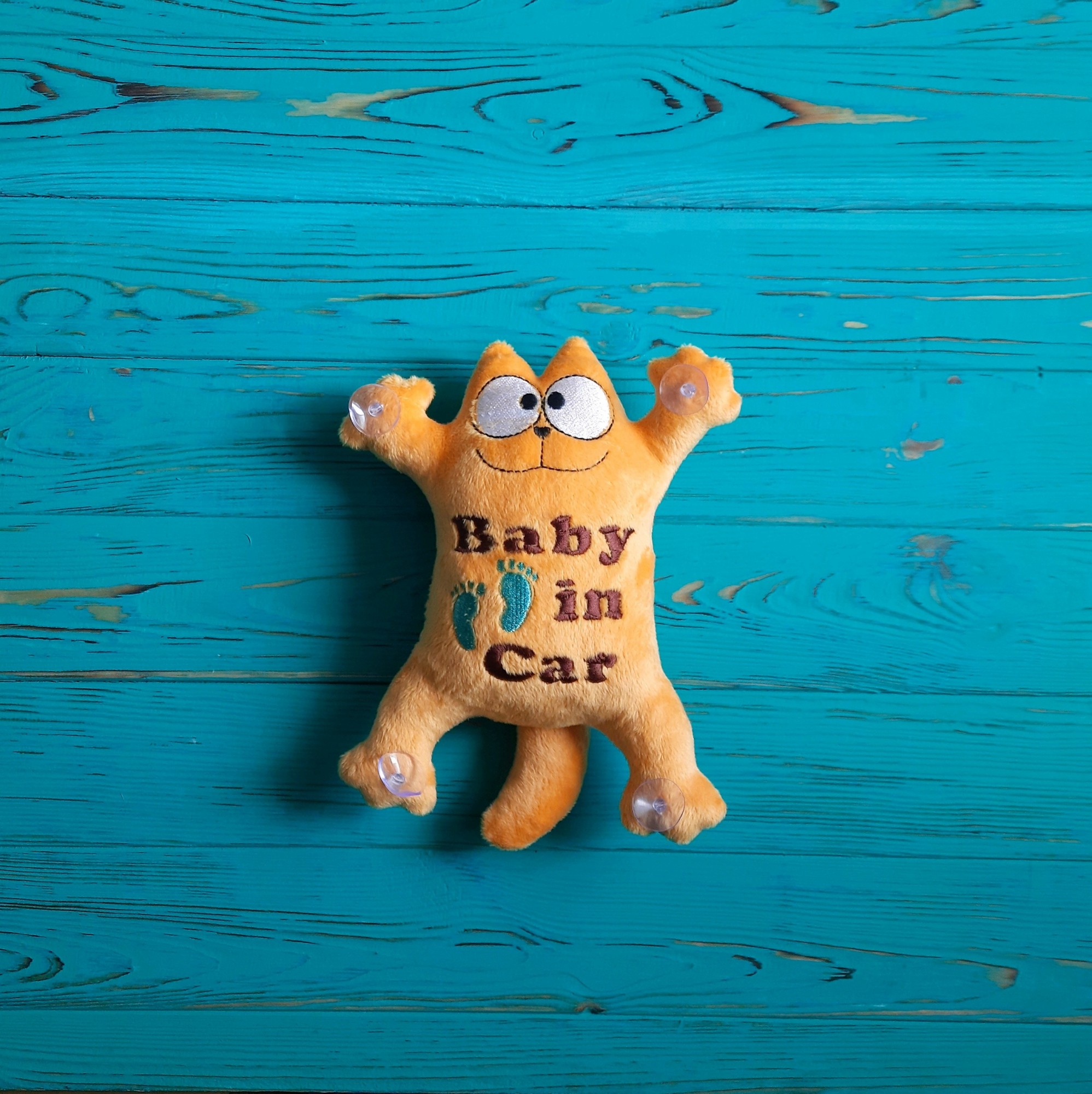 

Мягкая игрушка Baby Textile Кот Саймон на присосках Ребенок в авто ручная работа 26 см Оранжевый
