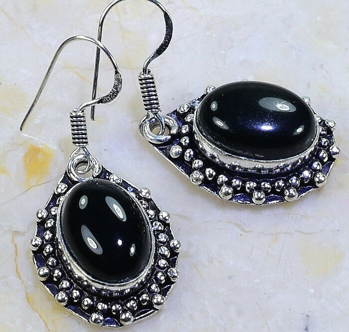 

Серьги с камнем оникс X56262