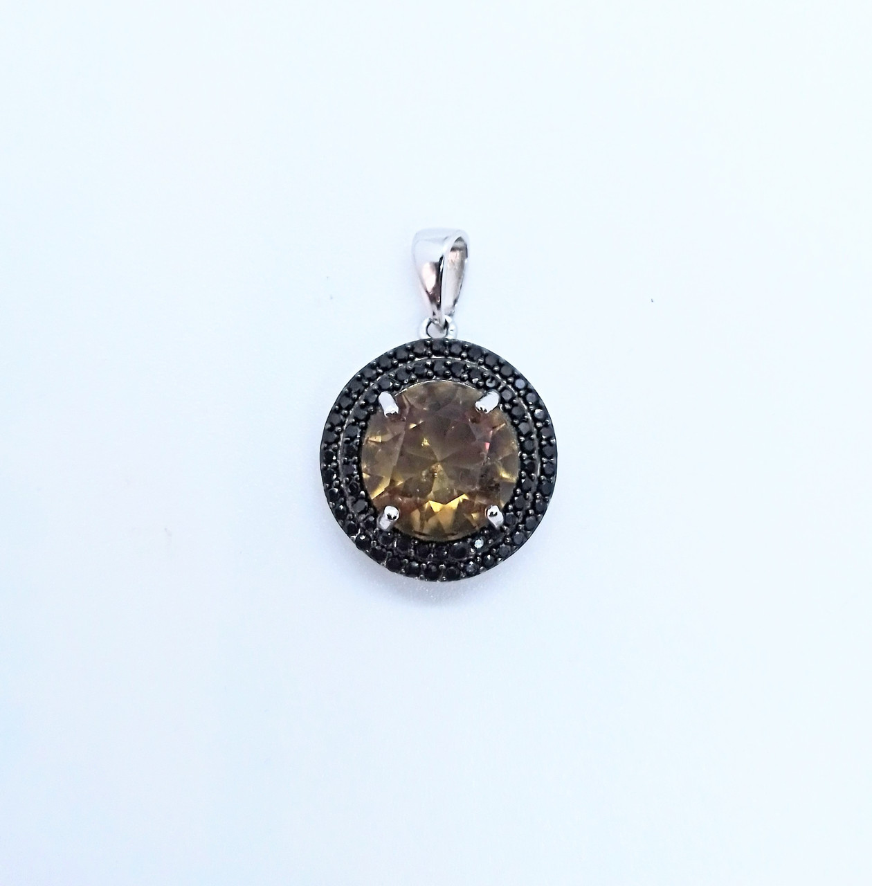 

Срібна підвіска з круглим султанитом 080962