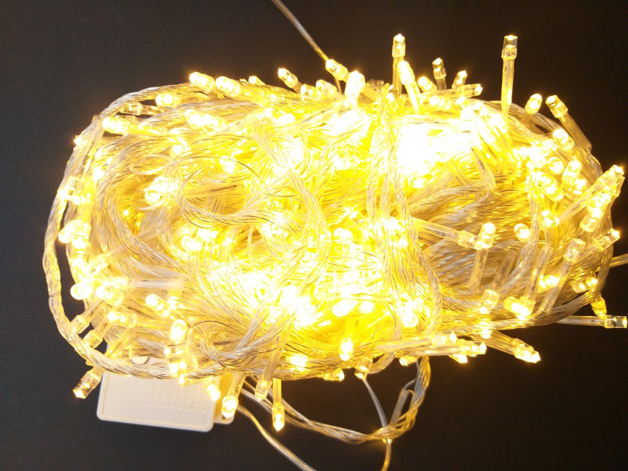 

Светодиодная гирлянда прозрачный провод 300 LED 24 м. Белый теплый
