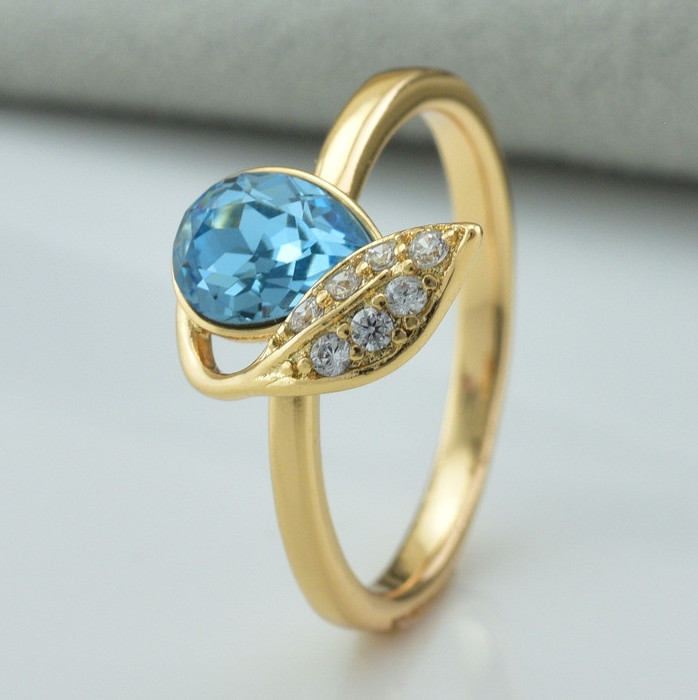 

Кольцо Xuping с кристаллами Swarovski 83231 ширина 15 мм цвет аквамариновый позолота 18К16