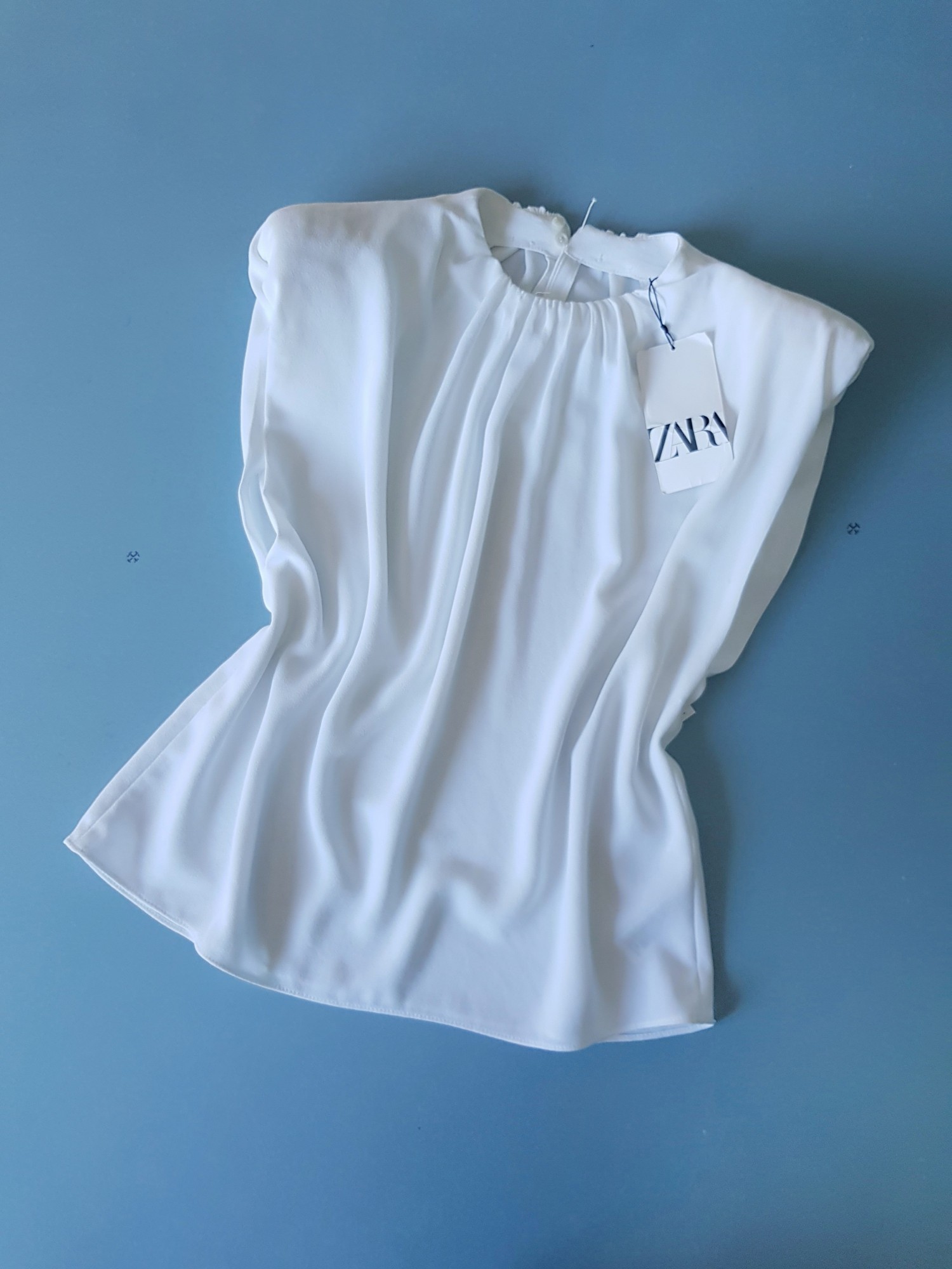 

Блузка белая с подплечниками Zara 8711-1111 L(46)