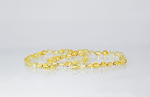 

Бусы янтарь барокко лимонный 1101