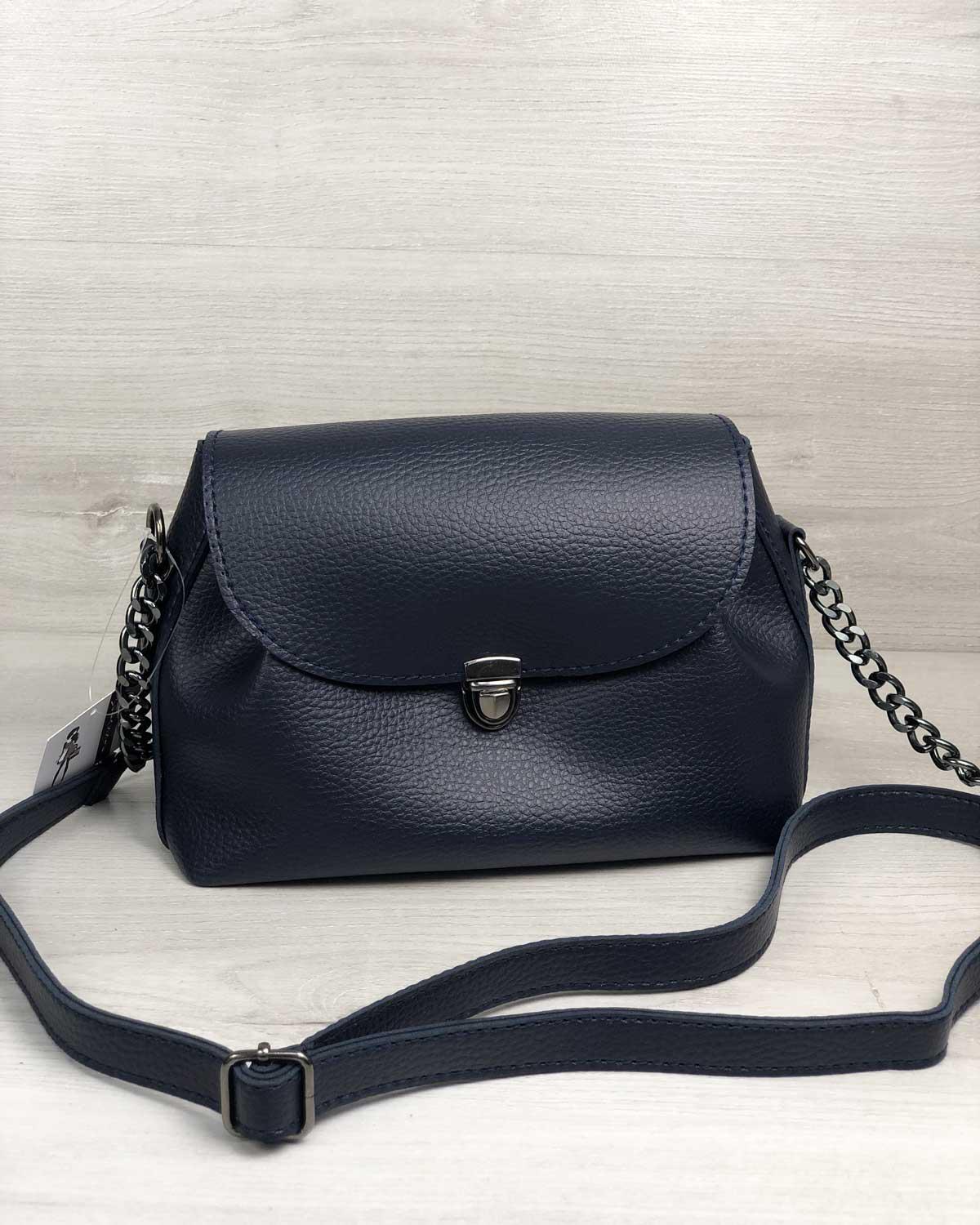 

Вместительная женская сумка из кожзама среднего размера синего цвета 16х23х11см