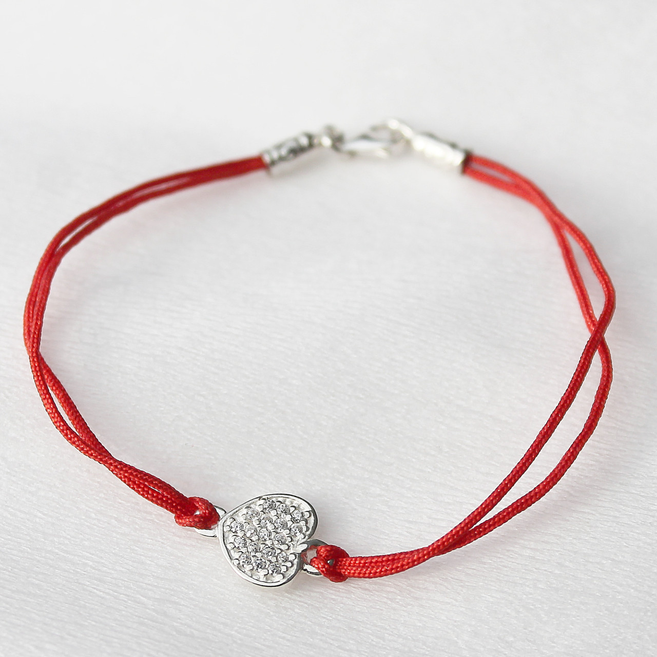

Серебряный браслет "Сердце" с красной нити 18,5р
