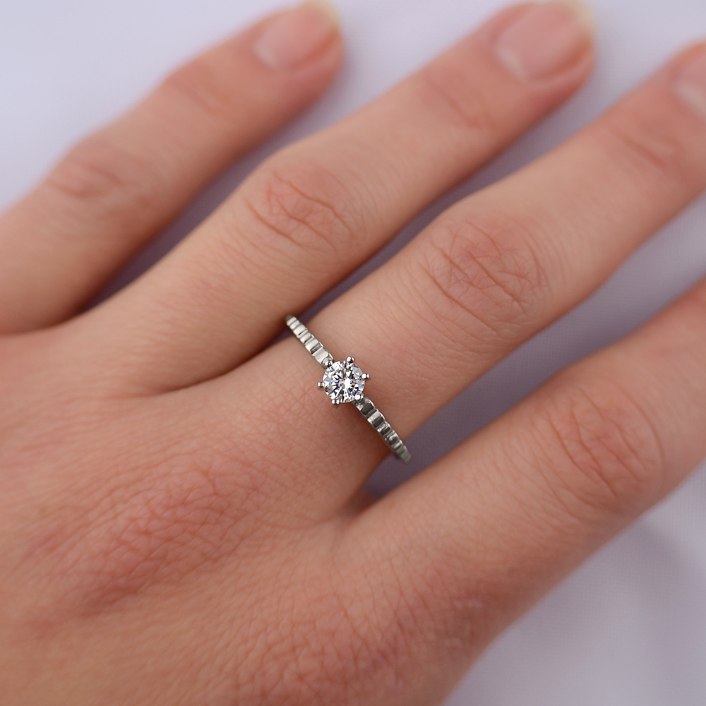 

Серебряное родированное кольцо для женщины Сердечки 33-kr 17