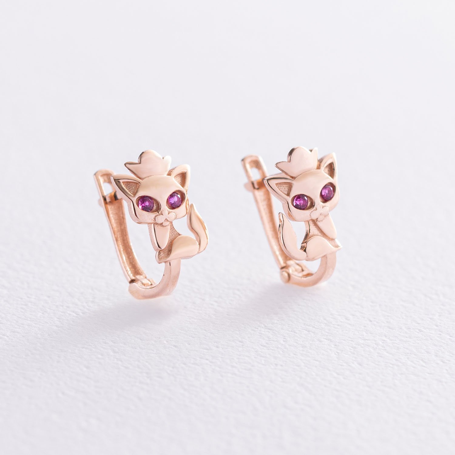 

Детские золотые серьги "Котята" (фиолетовые фианиты) с07549 Оникс