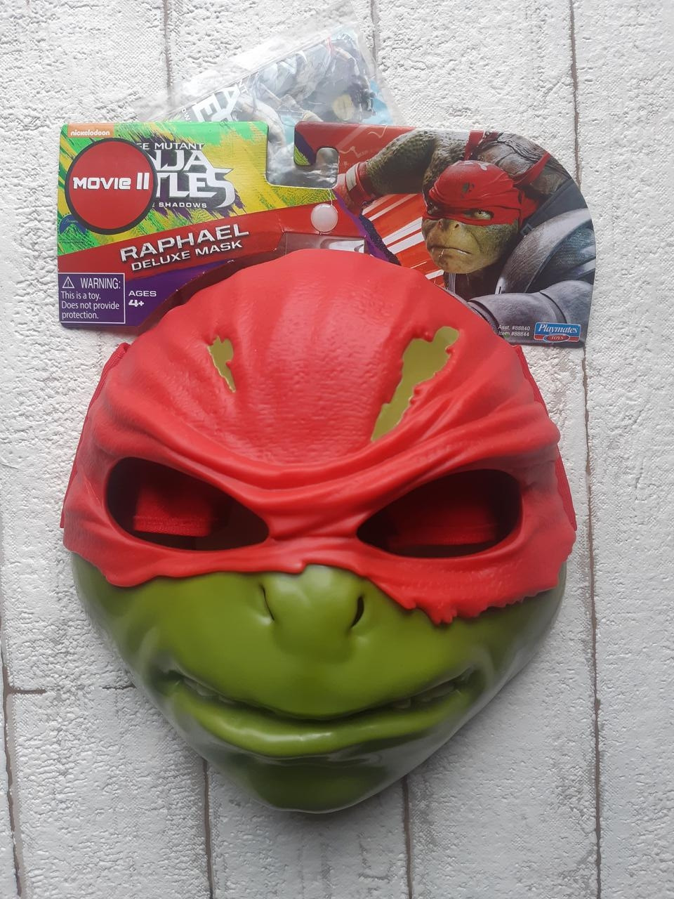 

Игрушечное снаряжение TMNT Черепашки-ниндзя Movie 2 Маска Рафаэля 88844