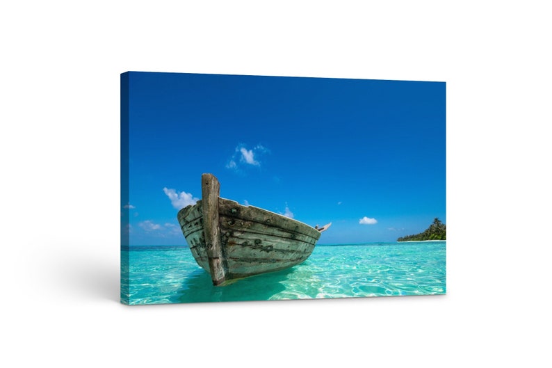 

Картина на холсте Лодка в голубом море51x34 см (62)