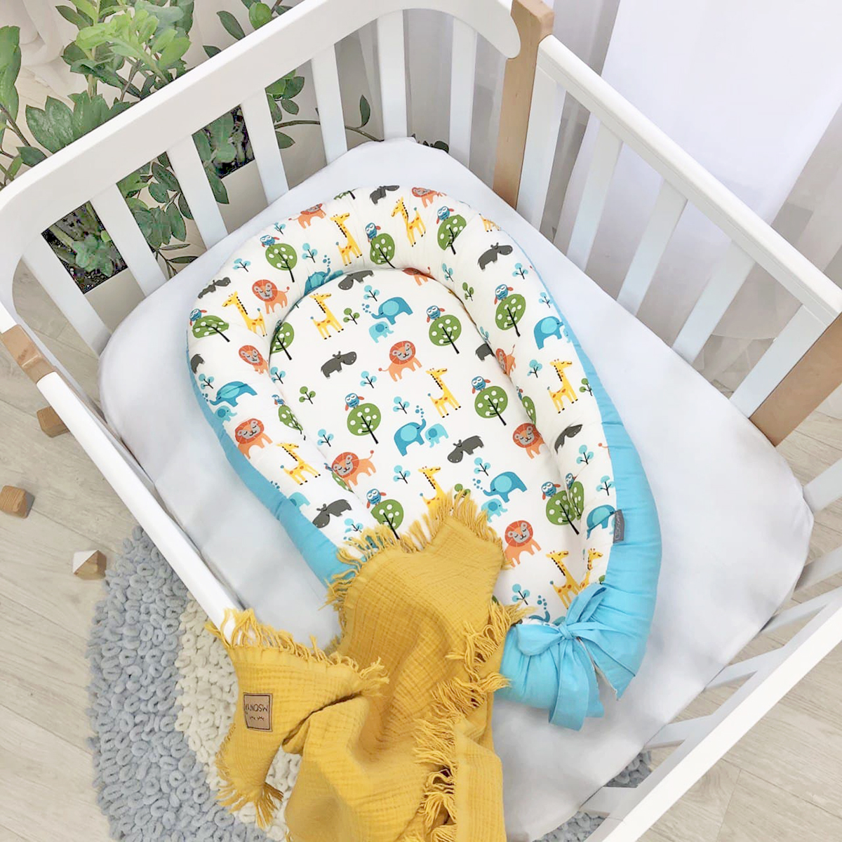 

Кокон позиционер для новорожденных 90х65 см Baby Design Premium Сафари