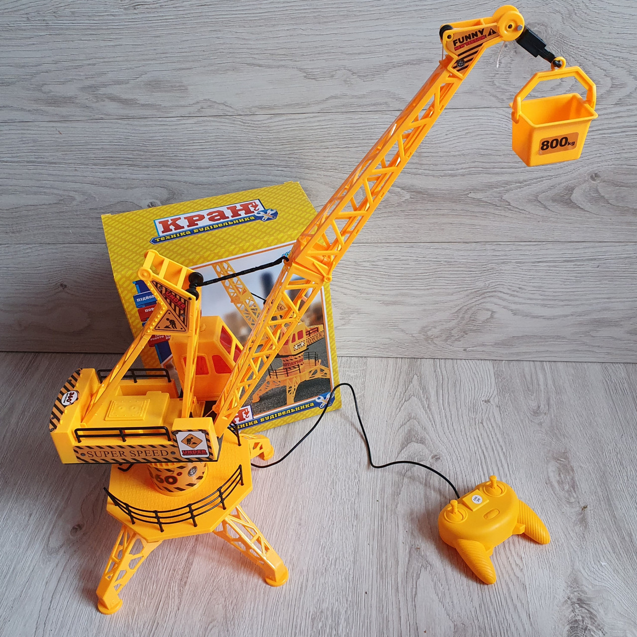 

Подъёмный кран на р/у с подсветкой 65 см Funny Toys Желто-черный
