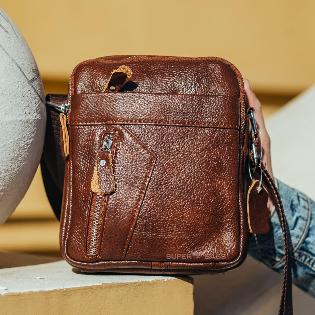 

Мужская кожаная сумка месенджер Tiding Bag 130140-NM 18 x 22 x 5 Коричневый