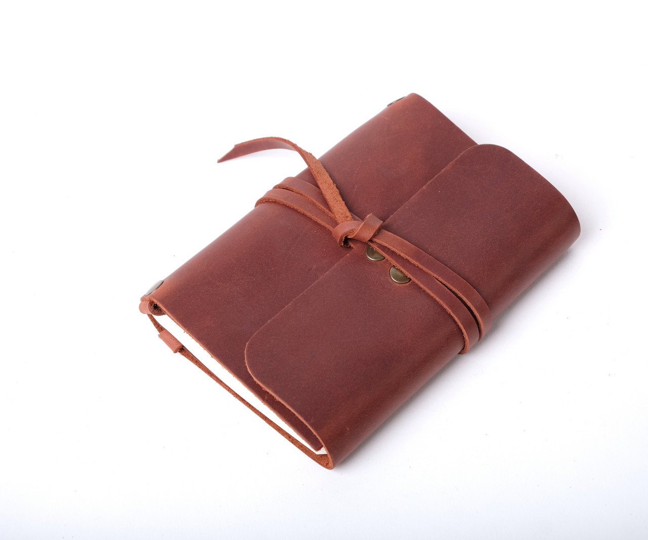 

Кожаный блокнот А6 «Nota6 Cognac» унисекс Янтарный (15x11 см) ручной работы от pan Krepko