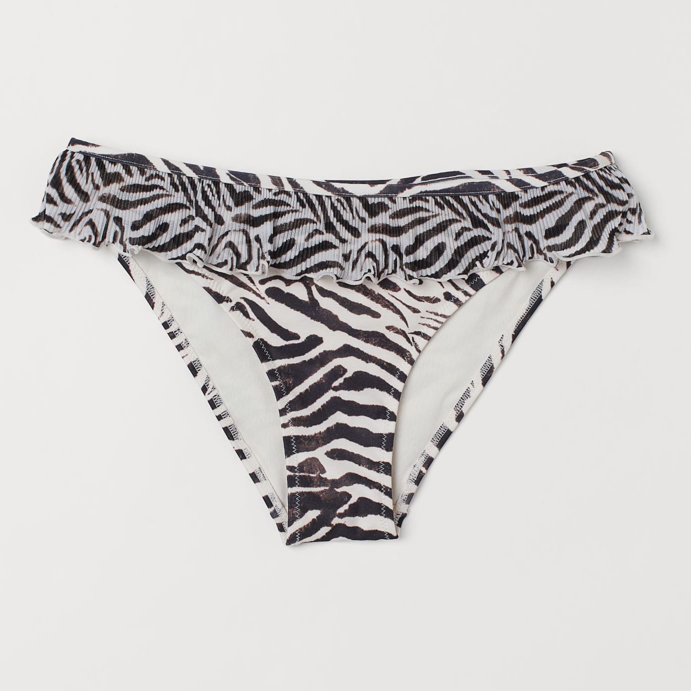 

Нижняя часть купальника H&M 0767398001  (170/100) Светло-бежевый/Принт Зебра, Нижняя часть купальника H&M 0767398001 40 (170/100) Светло-бежевый/Принт Зебра
