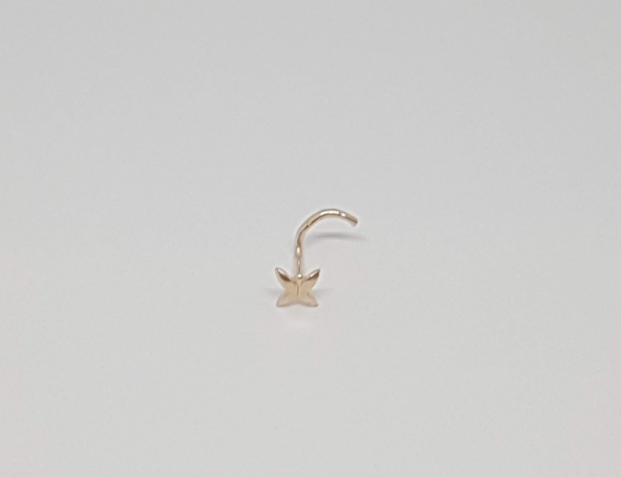 

Золотая серьга-пирсинг в нос. 1015