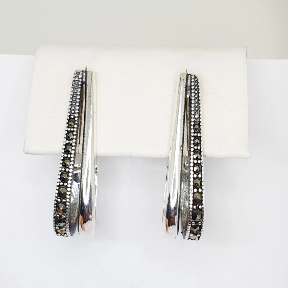 

Сережки серебряные с марказитом 5,23 г