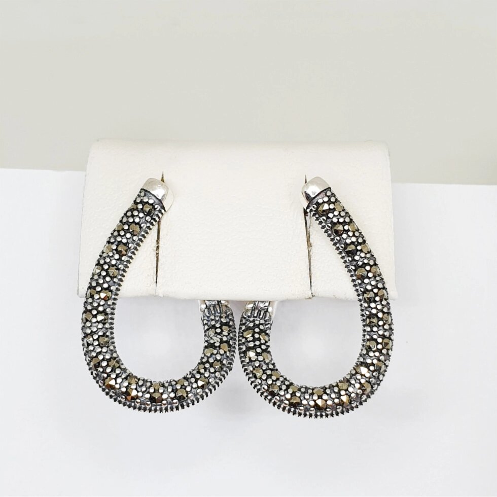 

Сережки серебряные с марказитом 4,66 г