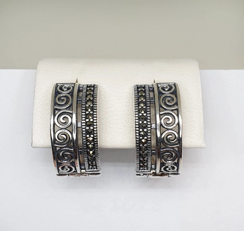 

Сережки серебряные с марказитом 7,68 г