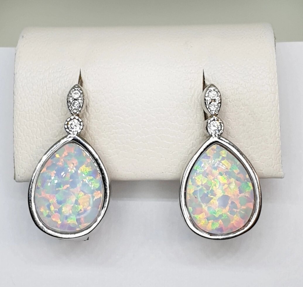 

Сережки серебряные с белым опалом 5,21 г