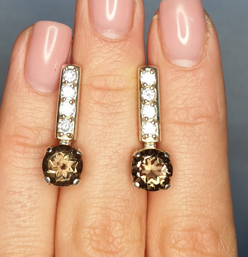 

Сережки серебряные с раухтопазом и кубическим цирконием 4,86 г