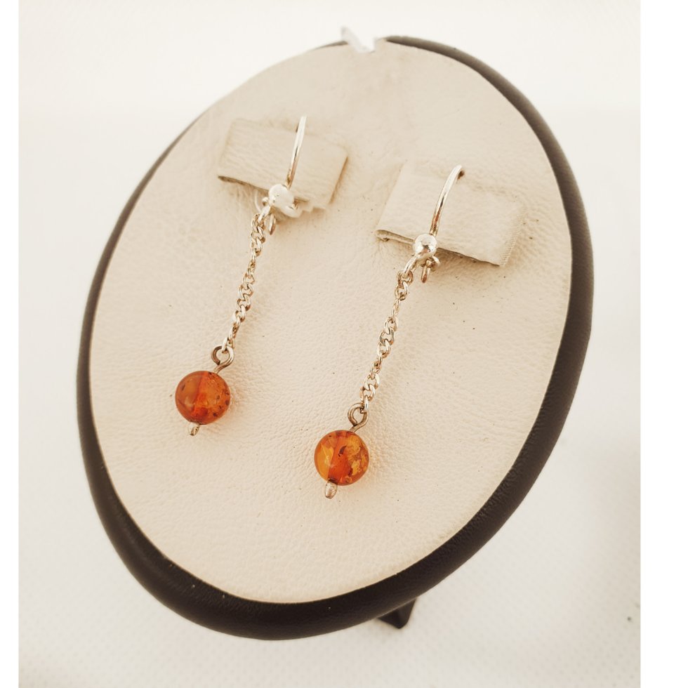 

Сережки серебряные с янтарем 1,78 г