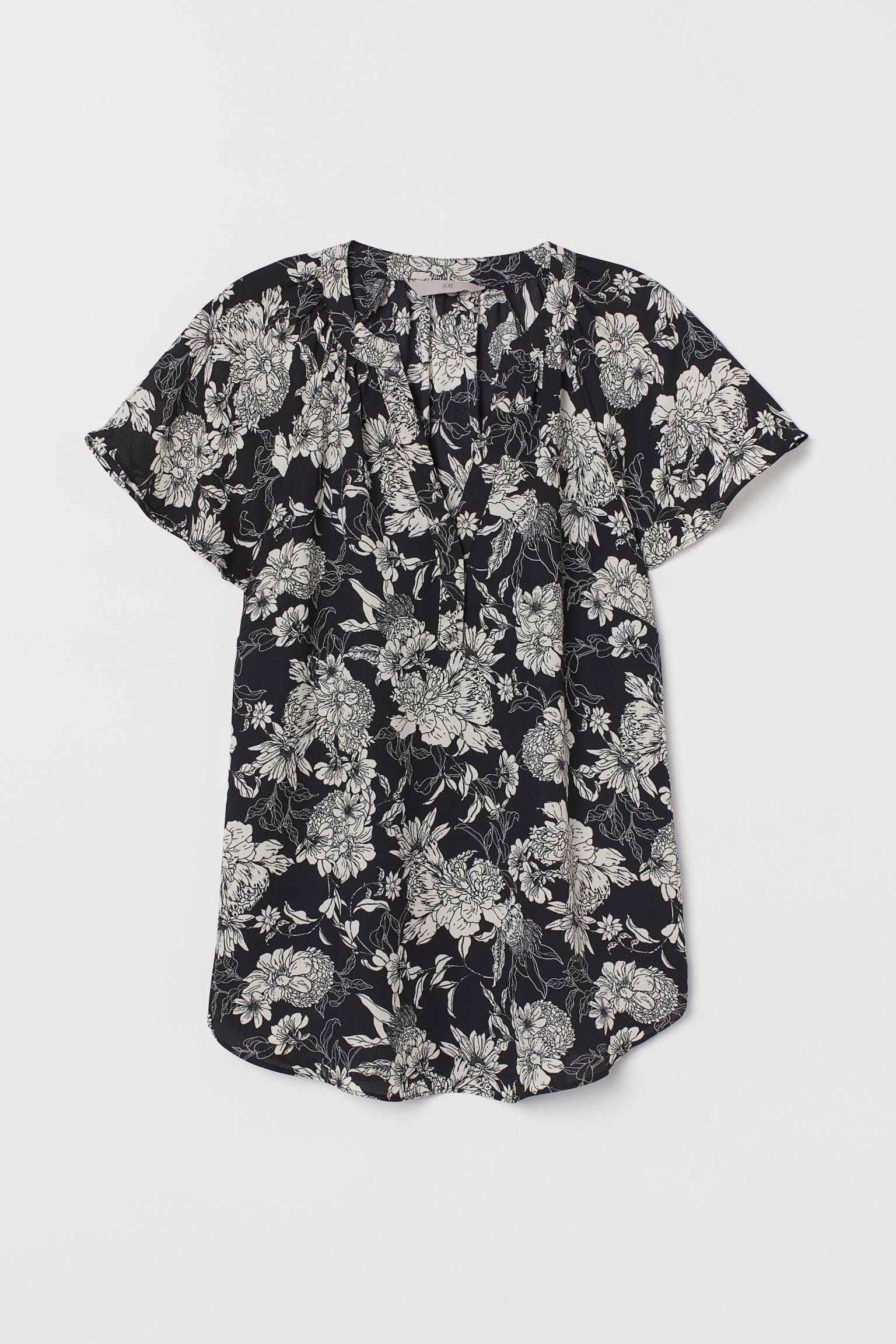 

Блуза H&M 34 черный белые цветы 21128557691