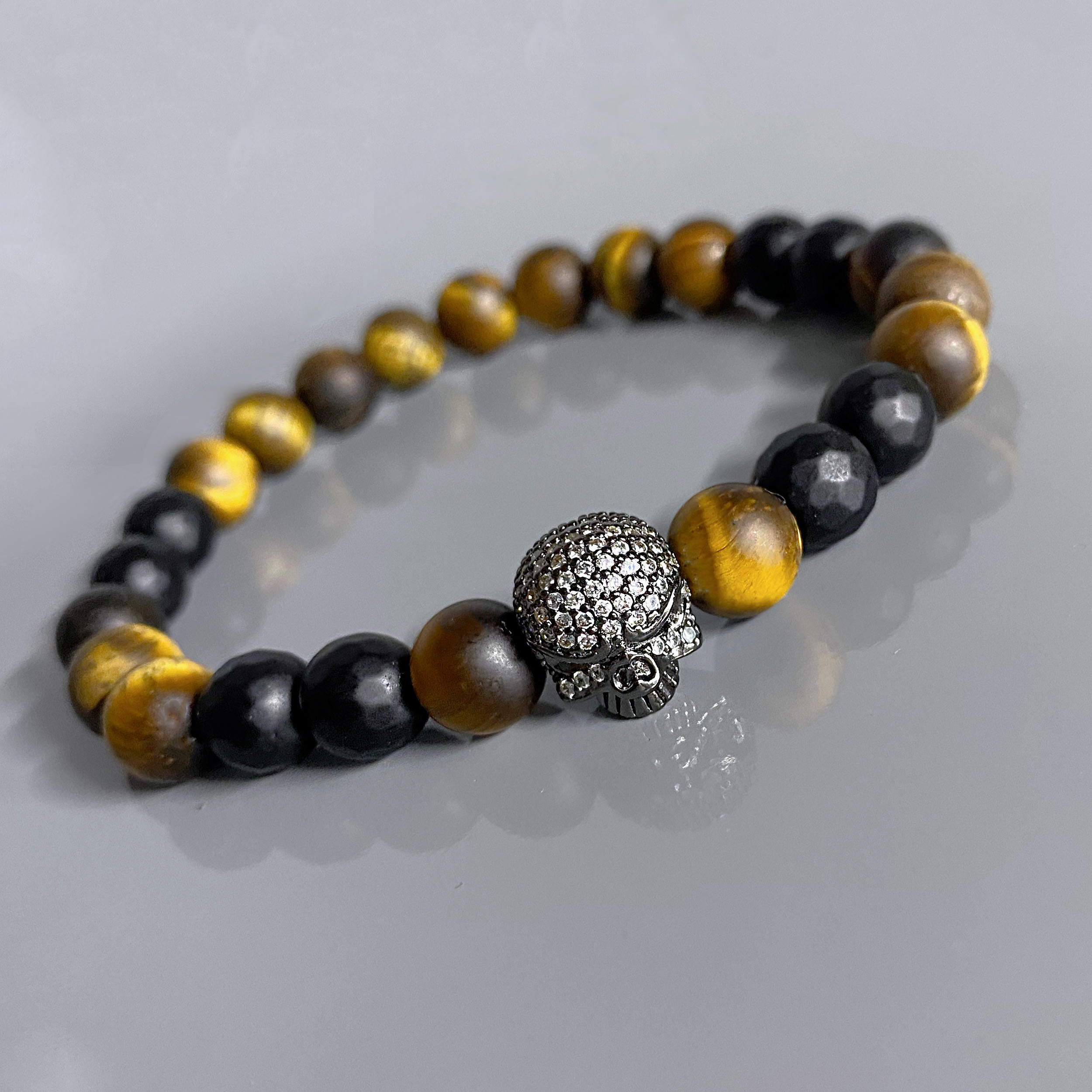 

Чоловічий браслет O`LORCAIN Skull із тигровим оком розмір 17
