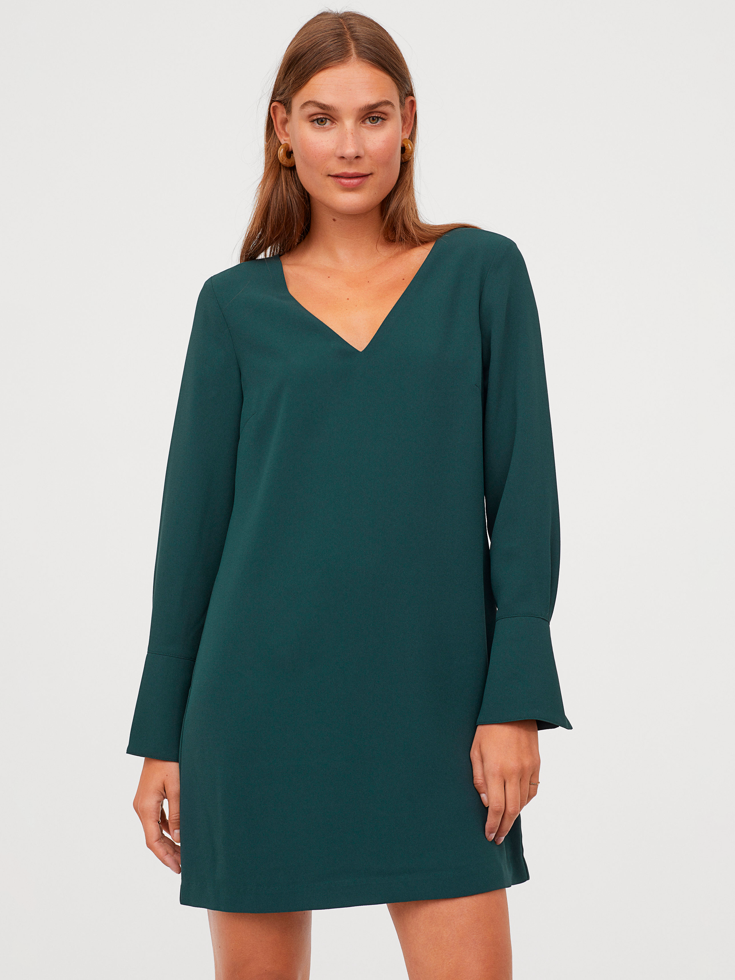 Акція на Сукня-футболка міні осіння жіноча H&M 02-0783497-0 34 Темно-зелена (СА2000001556153) від Rozetka