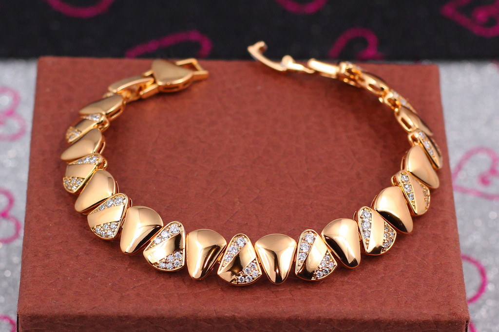 

Браслет Xuping Jewelry звенья из округленных трапеций 16 см 10 мм золотистый