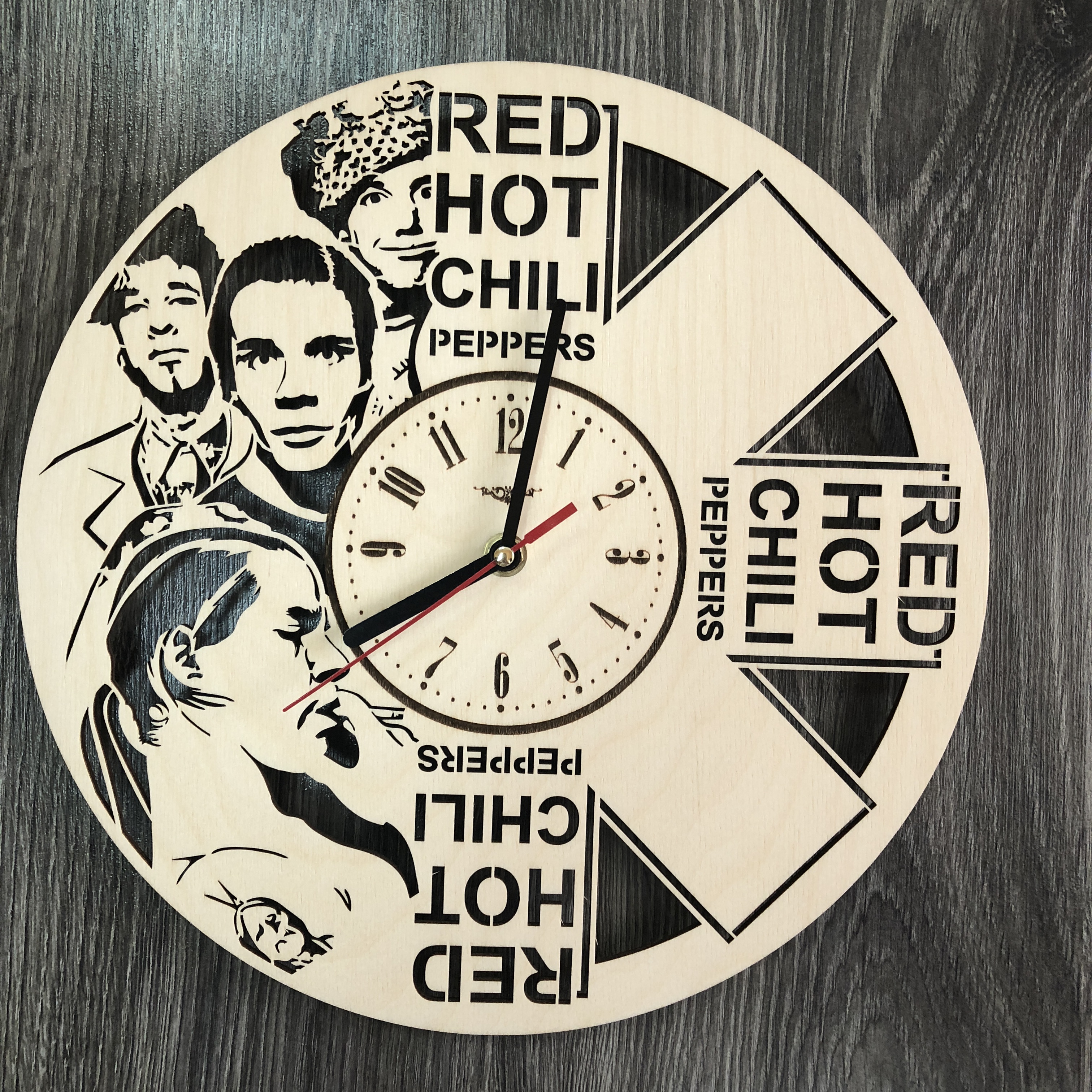 

Концептуальные настенные часы в интерьер Red Hot Chilli Peppers CL-0317