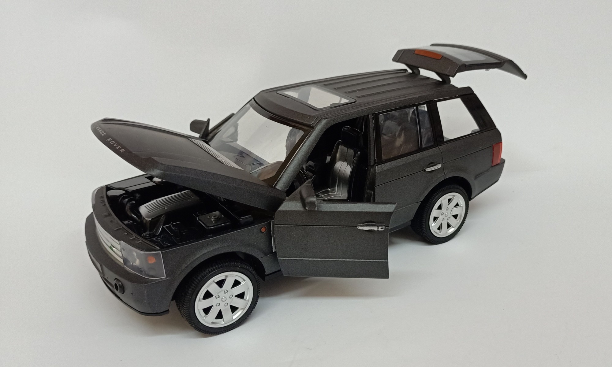 

Машина металлическая Range Rover Wanbao 890 (темно-серая)