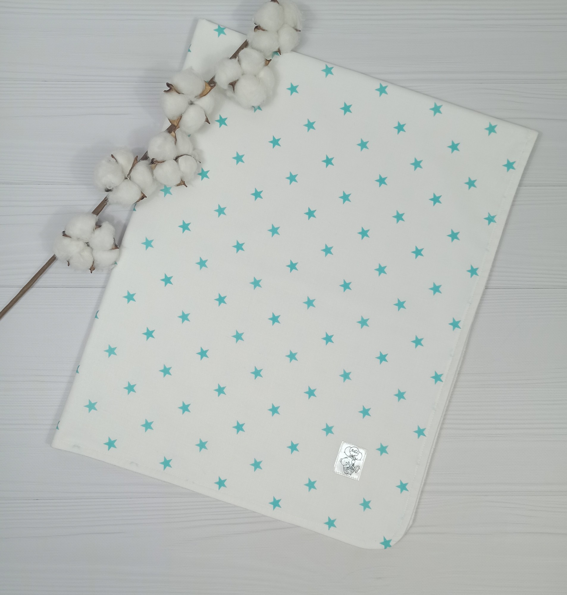 

Детская непромокаемая пеленка a.l.babybox Звезды мятные 100*80 см Разноцветный