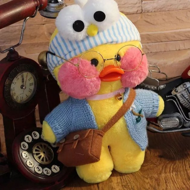 

Мягкая игрушка Плюшевая Лалафанфан Уточка Lalafanfan Duck в одежде 30 см желтый голубой