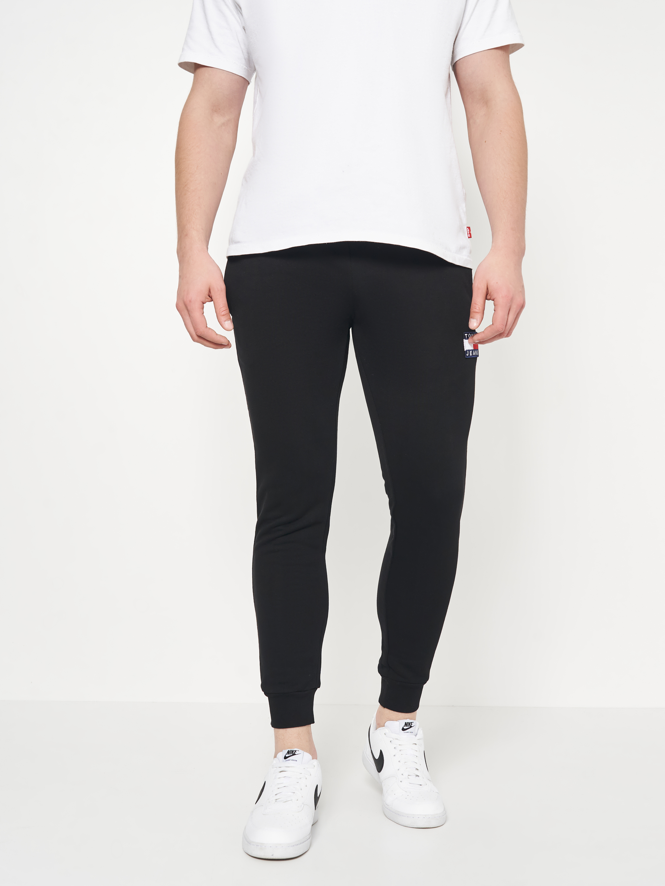Акція на Спортивні штани чоловічі Tommy Hilfiger 10963.1 XL (50) Чорні від Rozetka