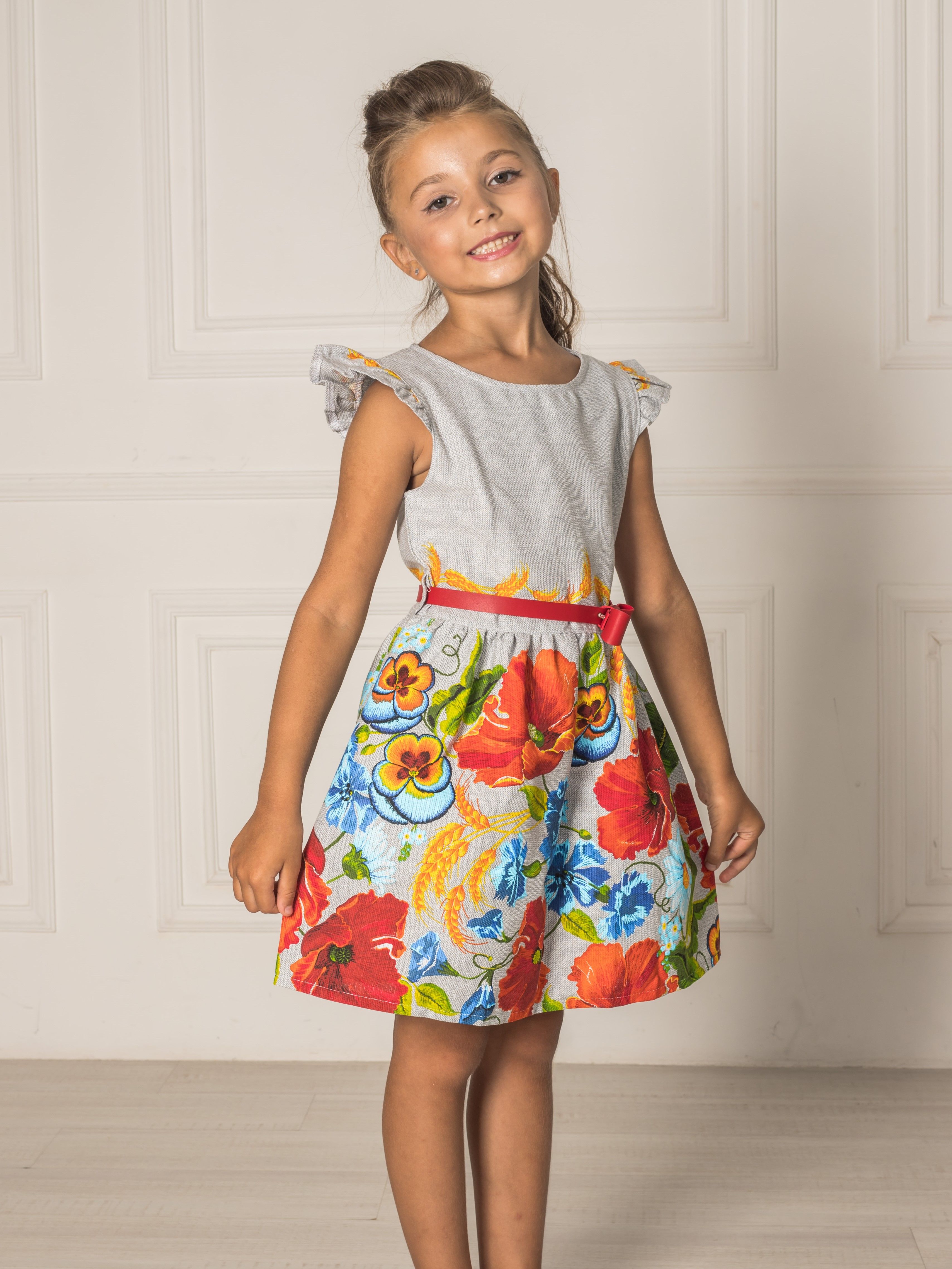 Акція на Дитяче літнє плаття для дівчинки Ласточка 20_3130 122 см Сіре в маки від Rozetka
