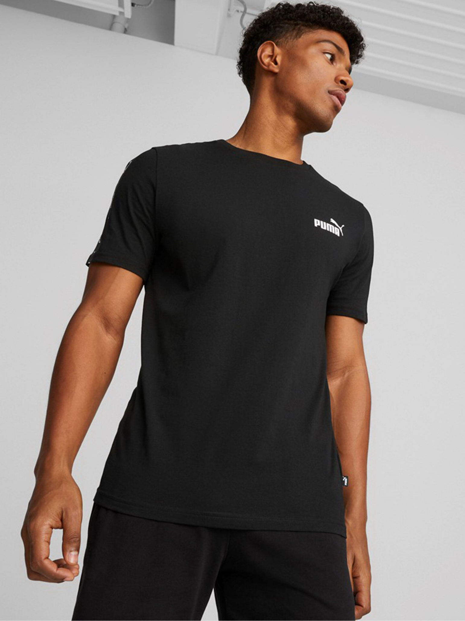 Акція на Футболка Puma Ess+ Tape Tee 84738201 XL Puma Black від Rozetka