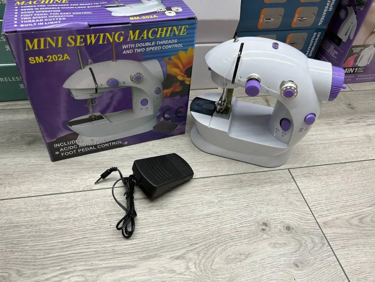 Портативная швейная машинка Mini Sewing SM202A с столом 4 в 1 – фото,  отзывы, характеристики в интернет-магазине ROZETKA от продавца: NEOLINE |  Купить в Украине: Киеве, Харькове, Днепре, Одессе, Запорожье, Львове