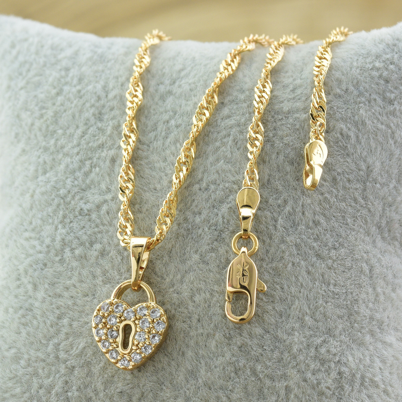 

Набор Xuping 90539 цепочка 45х0.2 см + кулон 17х10 мм белые фианиты позолота 18К