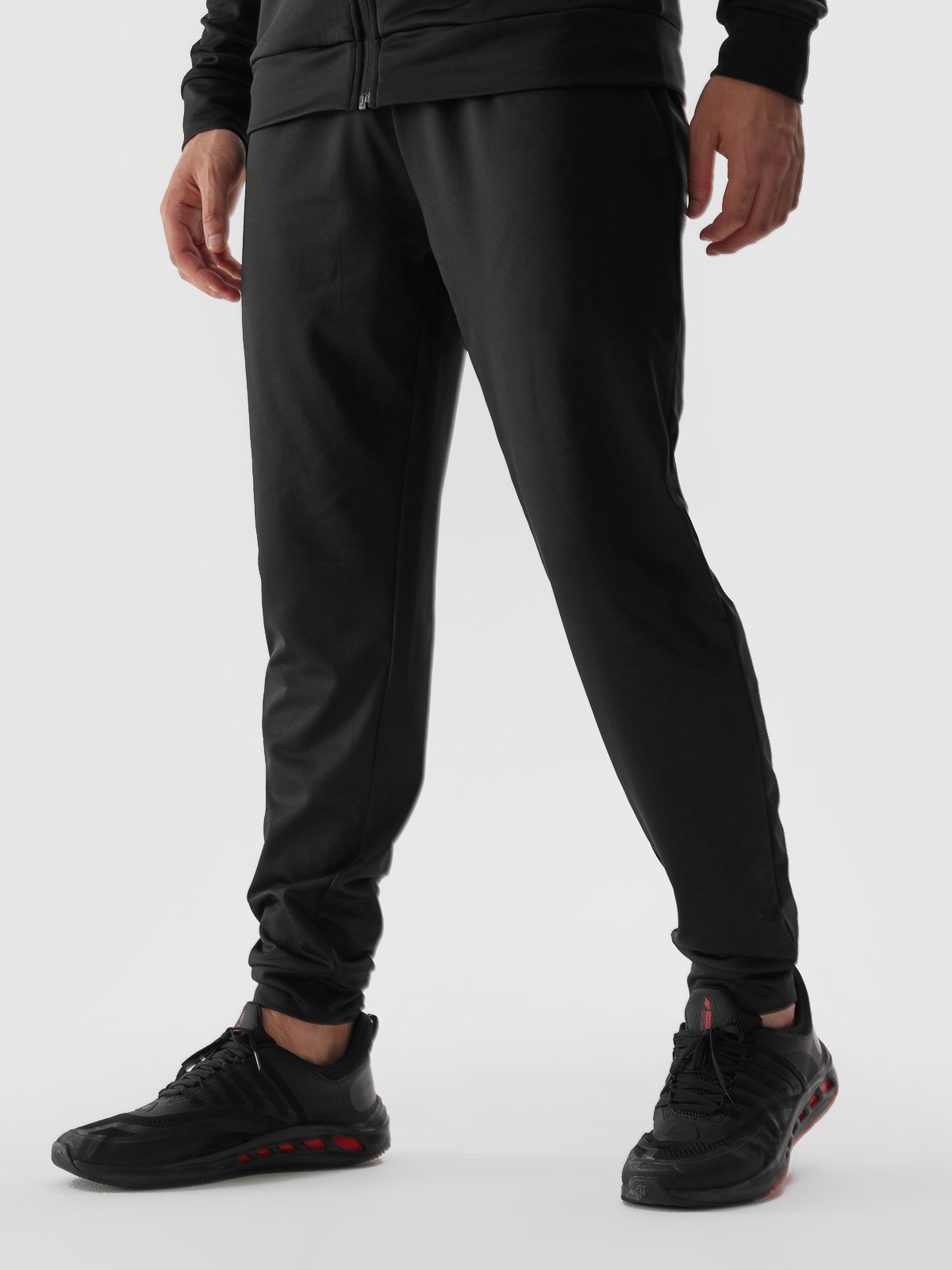 Акція на Спортивні штани чоловічі 4F Trousers Fnk M350 4FAW23TFTRM350-20S M Чорні від Rozetka
