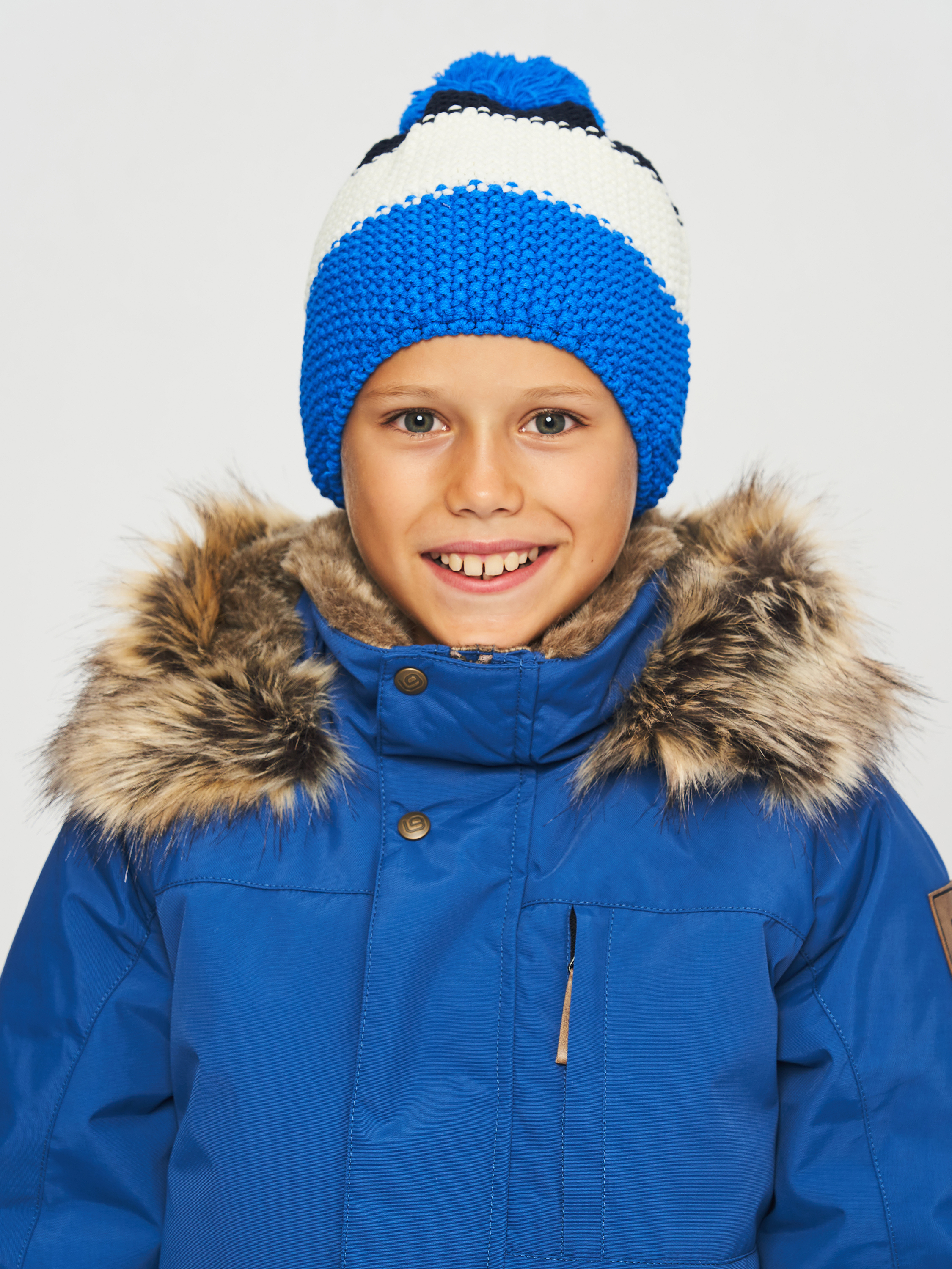 Акція на Дитяча зимова шапка-біні в'язана з помпоном для хлопчика Coccodrillo Accessories Winter Boy ZC2364316AWB-022 48 см Різнокольорова від Rozetka